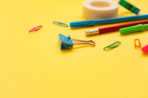 istock School supplies on yellow background 2166621987