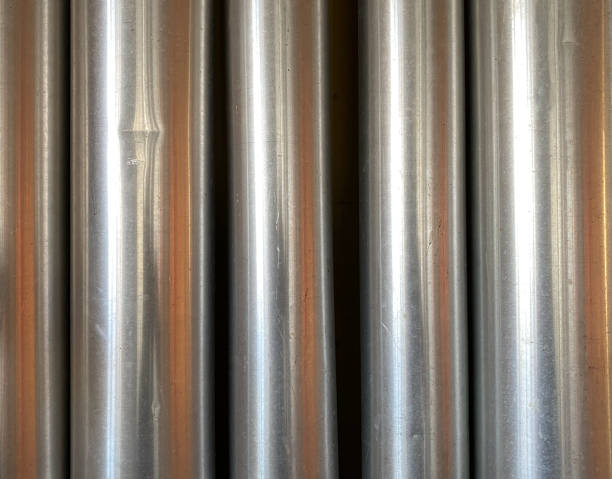 istock Abstract background, steel tubes in a production hall with reflections 2166622735