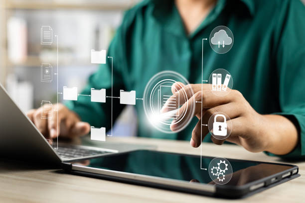 istock Document management system concept (DMS), Businessman working laptop virtual screen icons folder and document management system, Software for archiving, Searching and managing files corporate document 2166622979