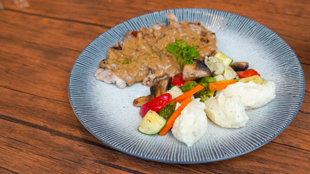 istock Grilled chicken with mushroom sauce 2166625166