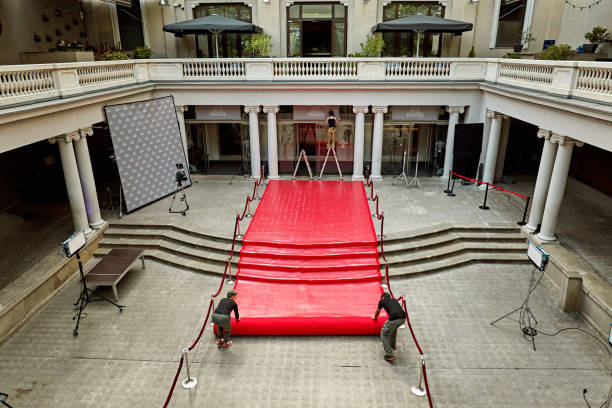 istock Setting up red carpet area for entertainment event 2166630509