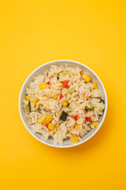 istock Cooked white rice mixed with colorful vegetables 2166630689