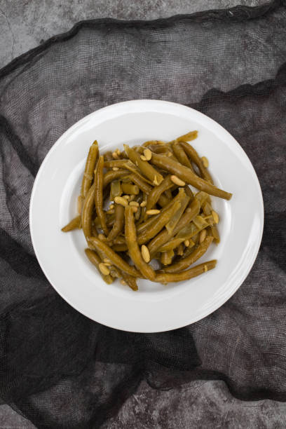 istock Boiled green beans on white plate 2166630705