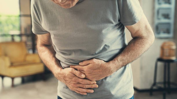 istock Senior man with stomach pain 2166631498
