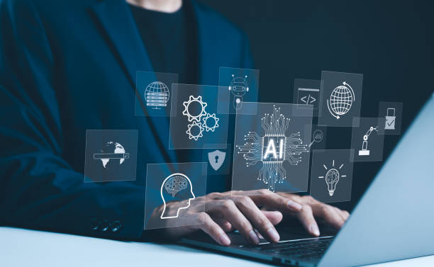 istock AI, Artificial Intelligence technology concept. Professional businessman working with an artificial intelligence (AI) conceptual interface, surrounded by gears and digital icons. intelligent tech, 2166633326