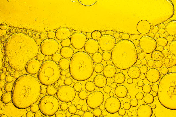 istock Yellow micro bubble texture,Multi colored bubbles of oil and water 2166640212