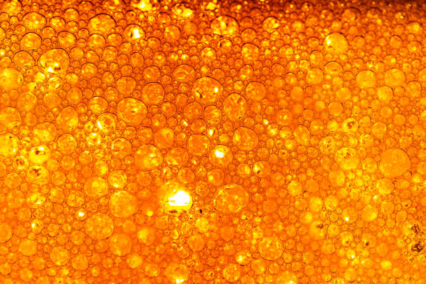 istock Macro beer foam texture,Beer background bubble foam texture liquid horizontal design banner 2166640406