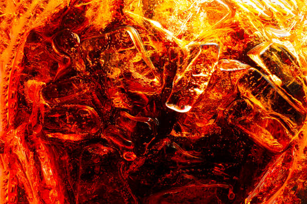 istock Macro cola background. Cola background with ice and bubbles. Side view background of refreshing cola soda with carbonation in vintage tone. Cola, Soda, Bubbles. 2166640537
