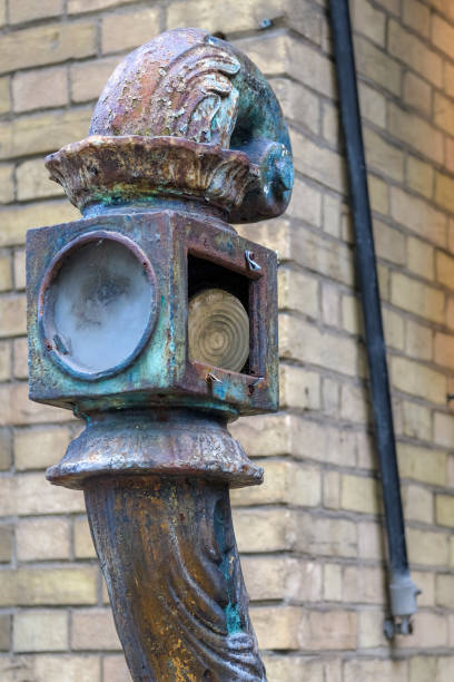 Ancient metal decorative structure on a stair railing. The building is to the left side (looking from the front) of the Courthouse Adelaide St., Toronto, Canada