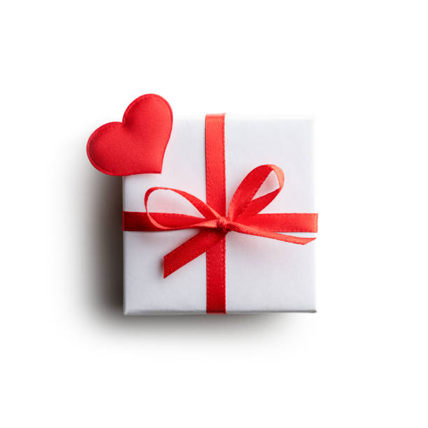 istock Gift box with red ribbon bow and red textile heart isolated 2166643795