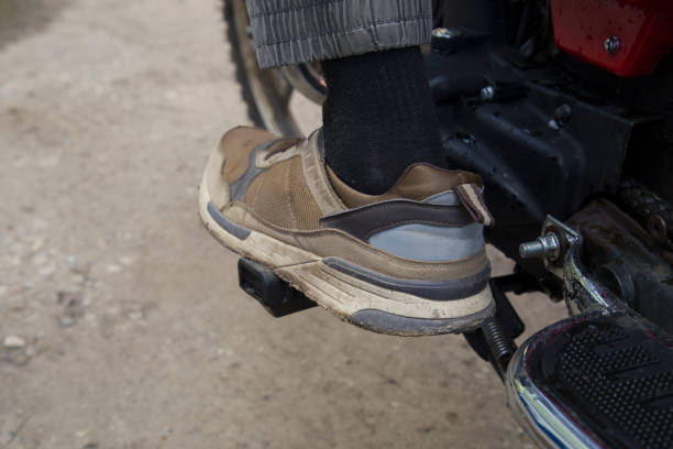 istock A man is riding a motorcycle.Close-up.Riding a motorcycle. 2166647847