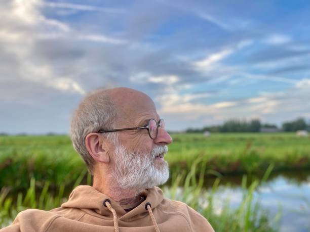 istock Relaxing man in the typical Dutch wetland Polder 2166647909