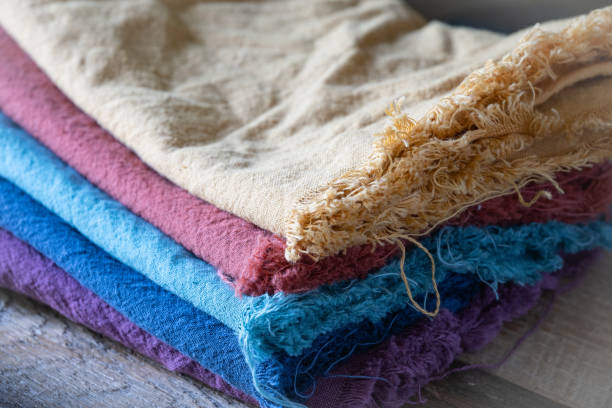 istock Stack of complementary autumn colors of cotton fabric. 2166648649