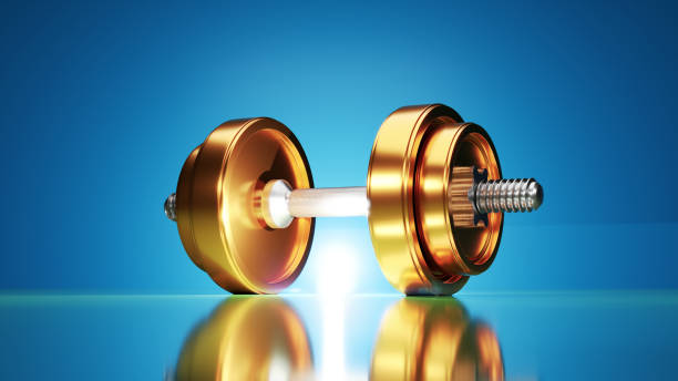 Golden Path to Success: Elevate Your Fitness with Dumbbells stock photo