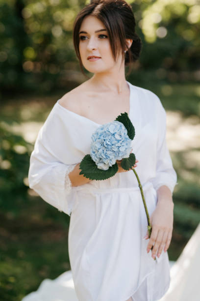 istock young girl bride in spring garden 2166654293