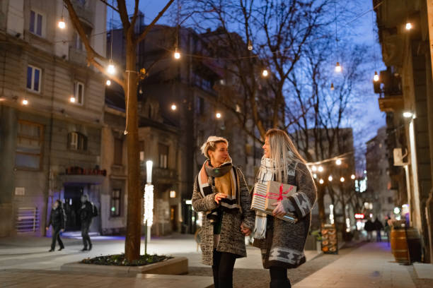 istock Evening Stroll in City with Lights 2166654701