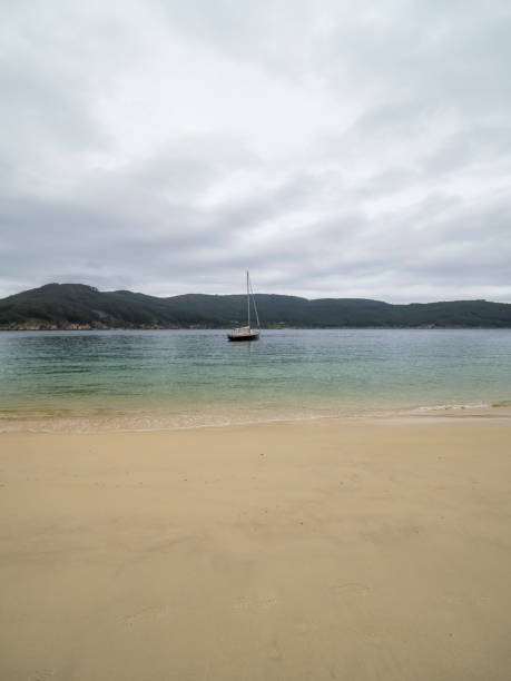 istock Lonely sailboat on the coast 2166655493