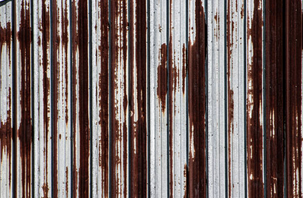 istock Red rusted white metal wall background 2166656318