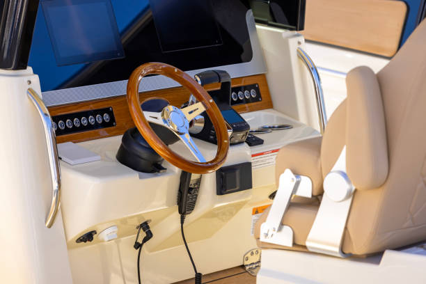 istock Luxury motorboat steering wheel and control panel, background with copy space 2166657261