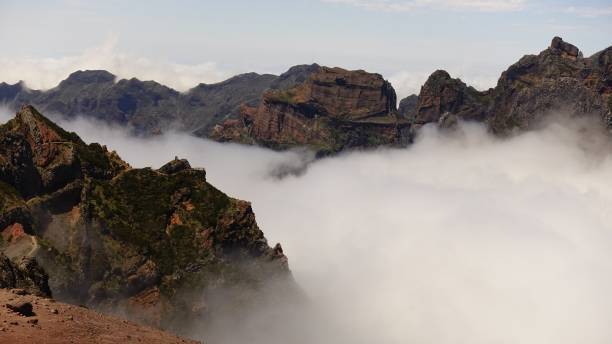 istock Overlooking a cloud inversion event while hiking in Pico Ruivo mountain trail in Madeira 2166658030