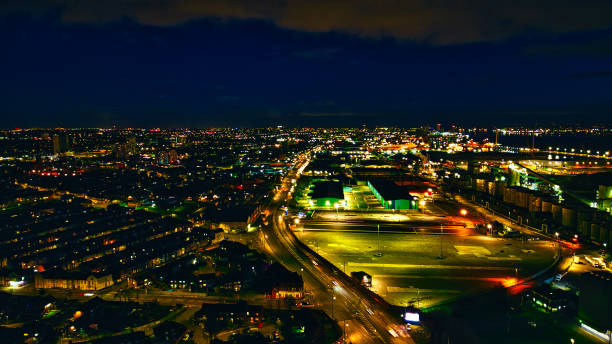 istock Nighttime cityscape with illuminated streets and buildings 2166659982