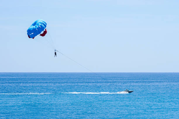 istock Idyllic parasailing view in the clear blue sea, the ultimate vacation experience 2166660177