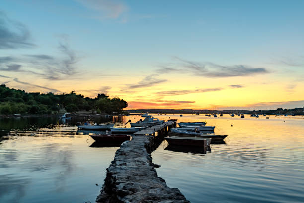istock Boats at the sunset dock 2166660573