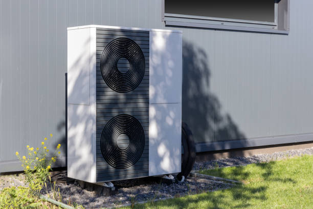 istock Heat pump unit installed outside a modern building 2166660582