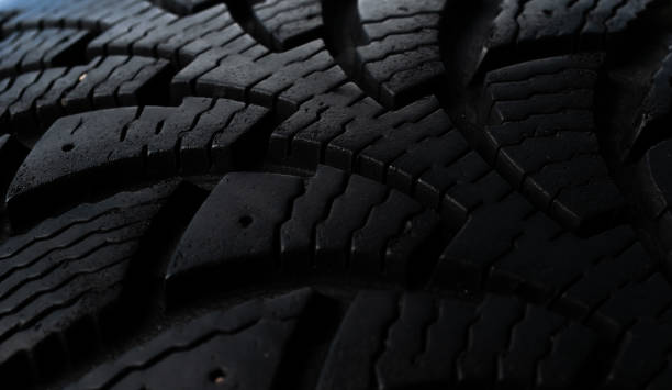 istock tire tread, tire traces background 2166665370