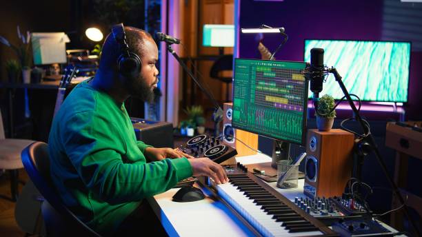 istock Talented musician mixing and mastering songs on a console 2166668295