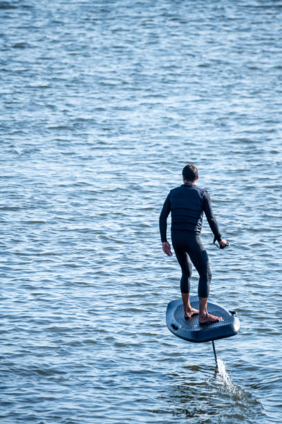 istock Hydrofoiling on a calm blue sea 2166672968