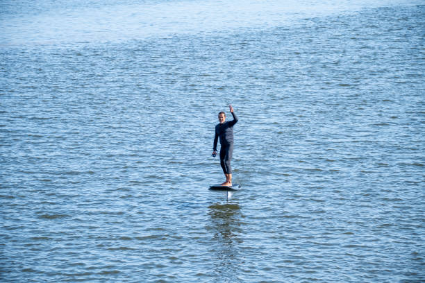 istock Hydrofoiling on a calm blue sea 2166672984