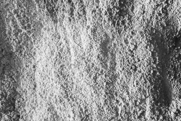 istock Concrete texture. Artistic stucco cement background for publication, design, poster, calendar, post, screensaver, wallpaper, postcard, card, banner, cover, website. Toned high quality photo 2166674948