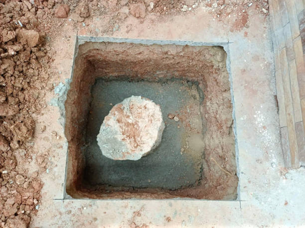 istock cement in the hole on the ground 2166677443