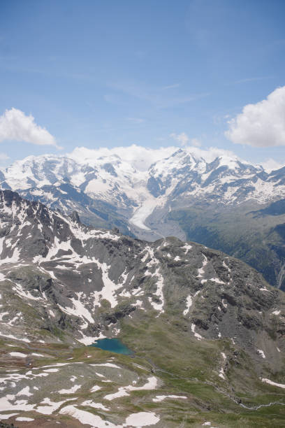 istock Scenic view of mountains in summer 2166679810