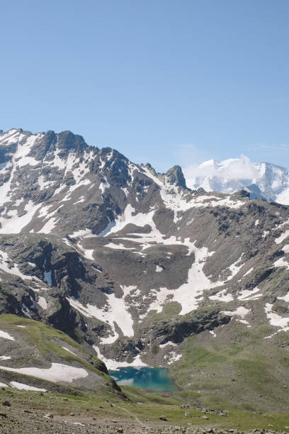 istock Scenic view of mountains in summer 2166679911