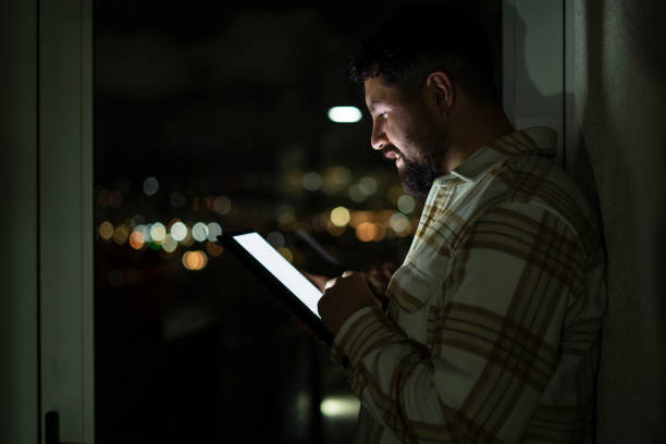istock Man looking at online shopping platforms from his digital tablet 2166684716