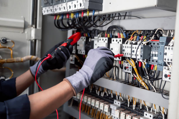 istock Electricity and electrical maintenance service,Electrical tests industrial electrical circuits with a multimeter in the control terminal box. 2166685591