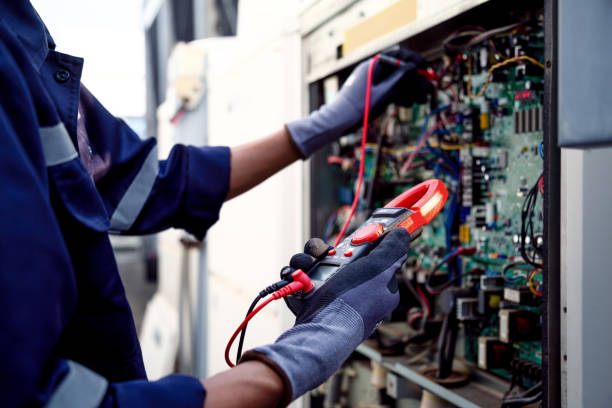 istock Air conditioning technicians and those preparing to install new air conditioners use a multimeter to check the operation of the compressor control panel system. 2166685602