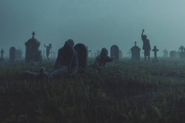 istock Empty spooky graveyard at night with hordes of undead 2166689969