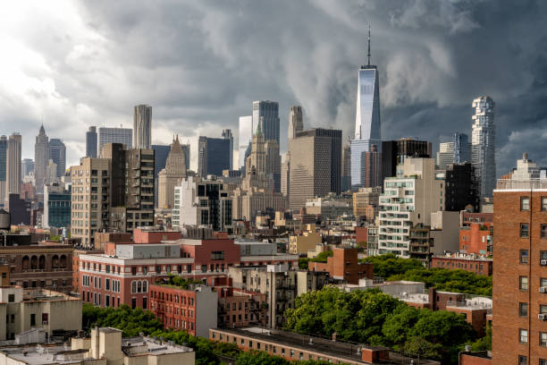 Thunderstorm clouds above New York City with Lower Manhattan Skyscrapers and Residential Buildings Thunderstorm clouds above New York City with Lower Manhattan Landmarks, Skyscrapers and Residential Buildings new york marathon photos stock pictures, royalty-free photos & images