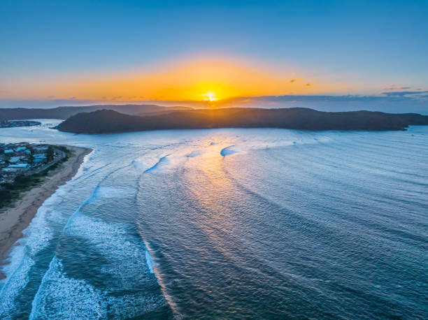 Sunrise at the seaside looking over Broken Bay from Ocean Beach