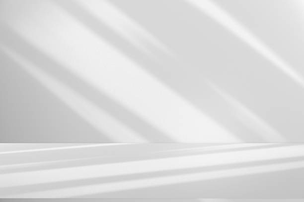 istock Studio style background wall decoration presentation uses white tones. with shadows cast from a nearby window, concept creating a decorative backdrop. 2166694735
