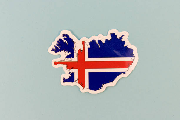 Iceland Map Shaped Sticker with National Flag Design on Light Blue Background with Copy Space.