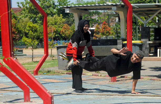 istock Adults playing their childhood games. 2166699119