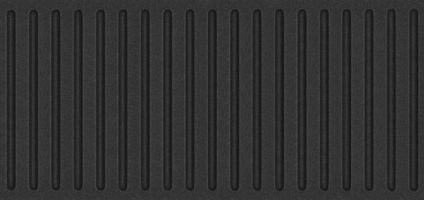 Black corrugated stripped metal ridge background