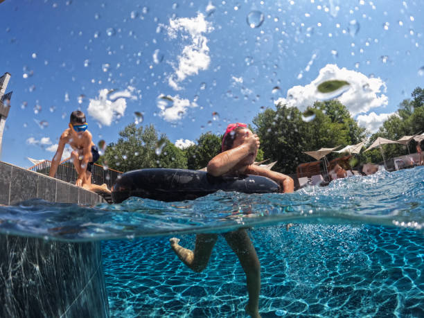 Having fun in the pool on a hot summers day