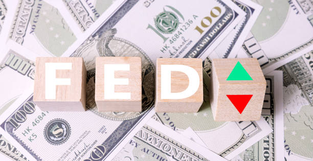 istock Federal Reserve Interest Rate Decision Concept with Currency Background 2166707176