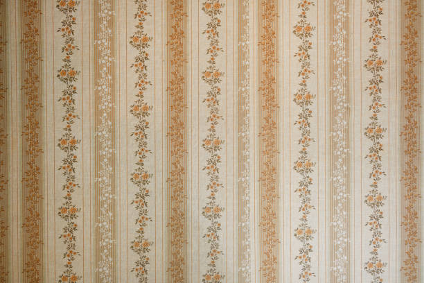 istock Old wallpaper on the wall. Old wallpaper for texture or background. 2166707265