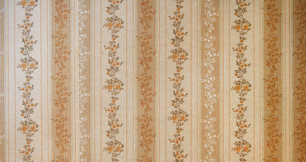 istock Old wallpaper on the wall. Old wallpaper for texture or background. 2166707522